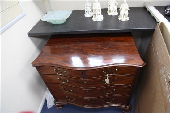 A George III serpentine mahogany chest, W.3ft 1in. D.1ft 9in. H.2ft 7in.